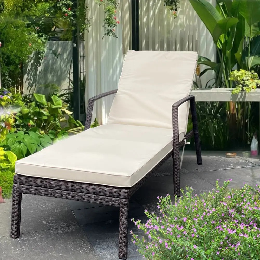 Outdoor lounge chair set featuring a reclining chair with cushioned seat and backrest, perfect for relaxing in a garden setti...